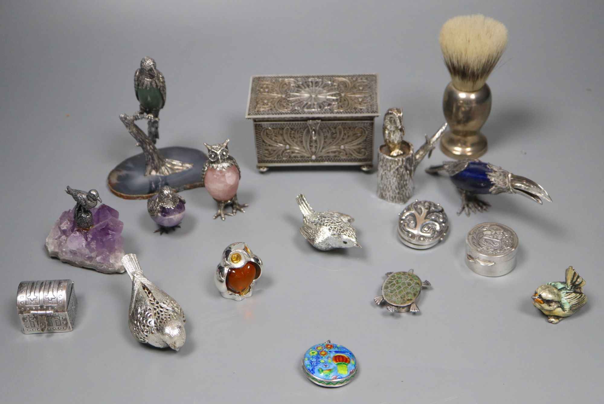 A group of small silver, plated and white metal items
